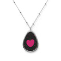 Heart Apple Oval Necklace — Pink Heart Pendant on Black Stardust Background